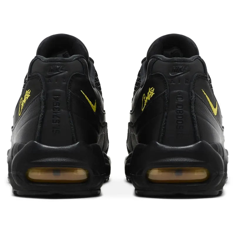 Corteiz x Nike Air Max 95 SP 'Honey Blacks' sneaker with black leather upper, yellow branding accents, and visible yellow-tinted Max Air cushioning