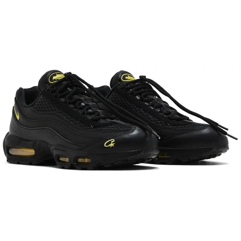 Corteiz x Nike Air Max 95 SP 'Honey Blacks' sneaker with black leather upper, yellow branding accents, and visible yellow-tinted Max Air cushioning