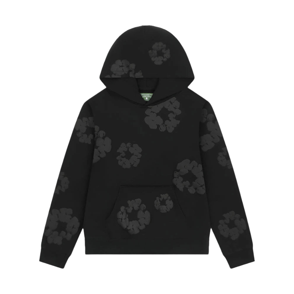 Denim Tears Black Mono Wreath Hoodie with monochrome puff-print wreath graphic, soft fleece fabric, and relaxed fit for bold streetwear appeal
