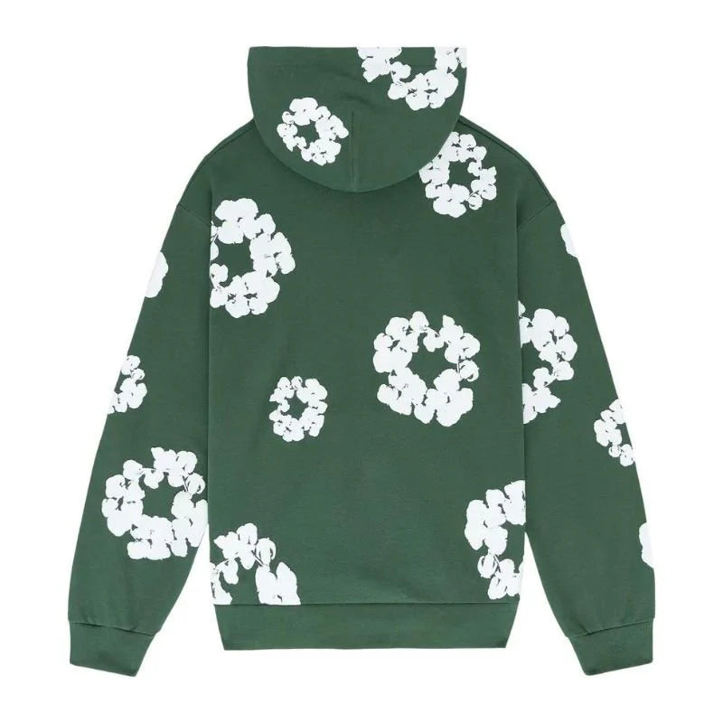 Denim Tears Cotton Wreath Sweatshirt in Green - premium cotton crewneck with signature wreath graphic, front chest detail.