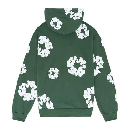 Denim Tears Cotton Wreath Sweatshirt in Green - premium cotton crewneck with signature wreath graphic, front chest detail.