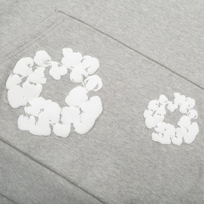 Denim Tears Cotton Wreath Sweatshirt in Grey with puff-printed wreath design, soft cotton build, and relaxed fit for versatile streetwear style