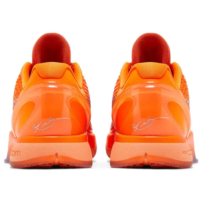 Nike Zoom Kobe 6 Protro 'Total Orange' sneaker with bright orange snakeskin upper, metallic silver Swoosh, Kobe logo on tongue, and Zoom Turbo cushioning