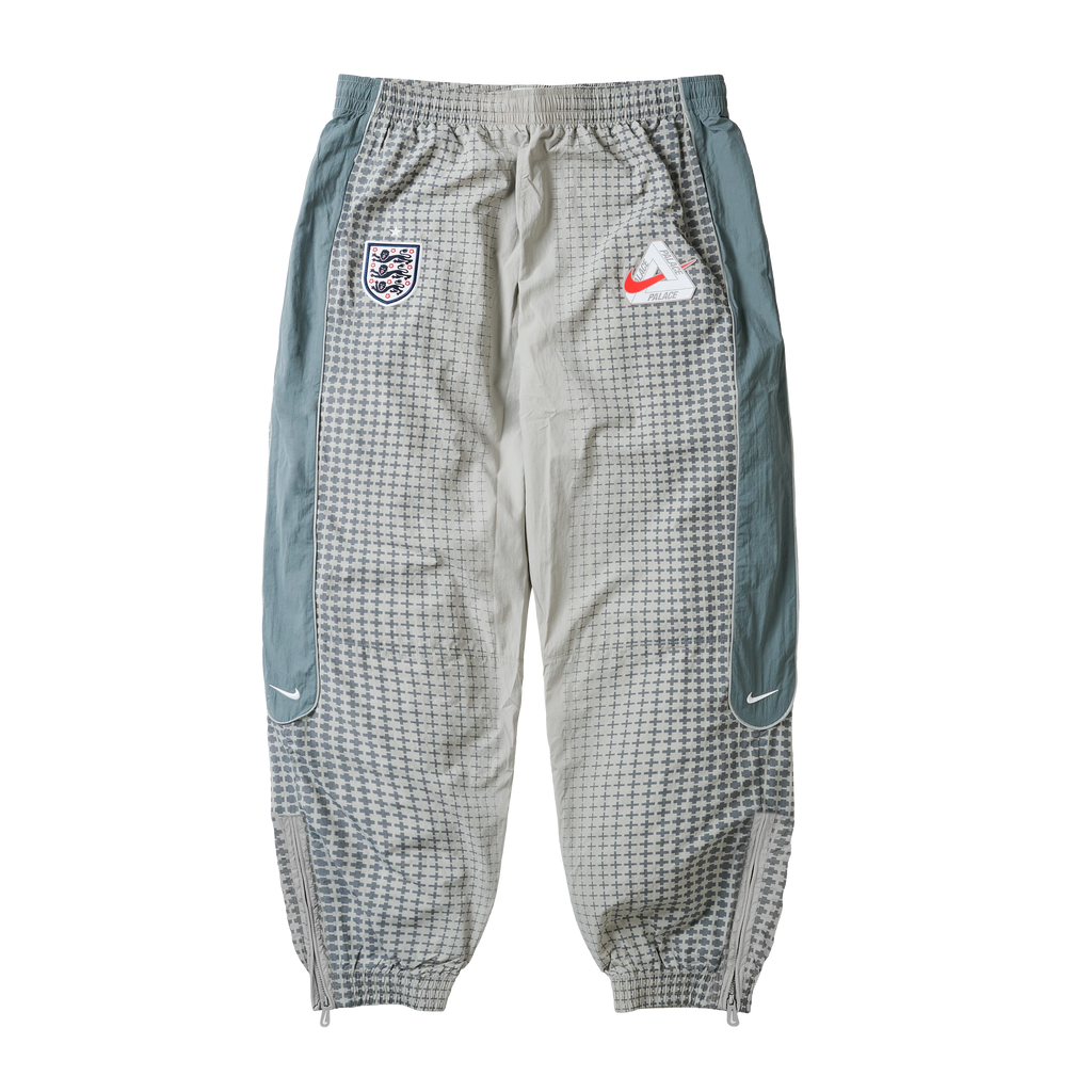 PALACE NIKE ENGLAND SOLO SWOOSH TRACK PANTS PEWTER GREY / COOL GREY / BRIGHT CRIMSON
