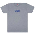 Supreme FW19 grey t-shirt with bold bandana box logo on chest, classic crewneck style, and regular fit for timeless streetwear appeal