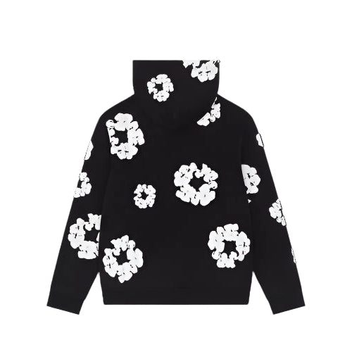 Denim Tears Cotton Wreath Sweatshirt in Black with puff-printed wreath design, soft cotton fabric, and relaxed fit for cultural and streetwear impact