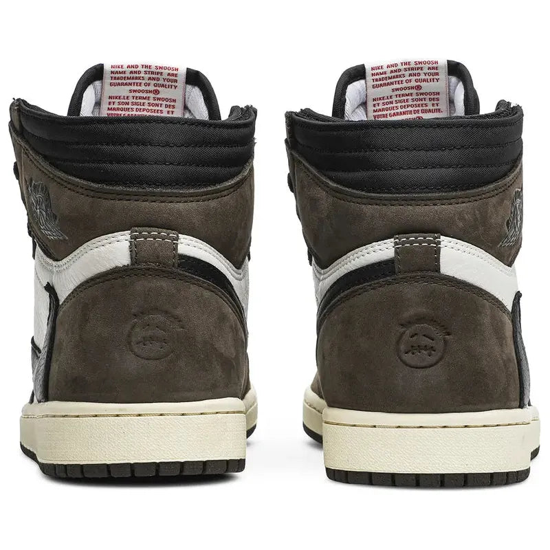 Travis Scott x Air Jordan 1 Retro High in brown suede and white leather with reversed Swoosh, heel logo, and double-layered collar. Ships from NZ with AU shipping.
