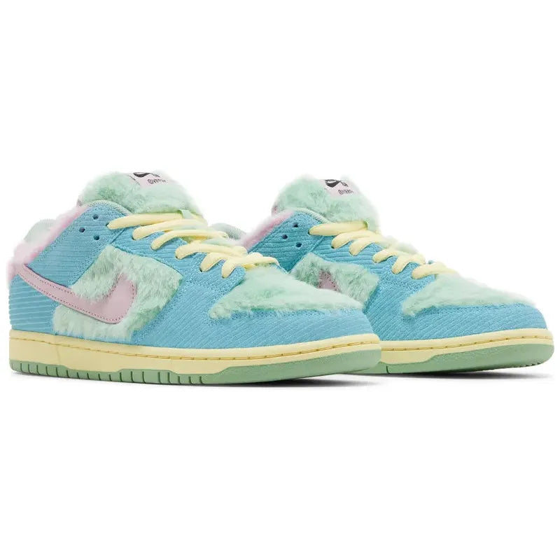 Verdy x Nike Dunk Low SB 'Visty' with green furry upper, pastel blue suede, pink Swoosh, yellow midsole, and Visty character branding on tongue and insole