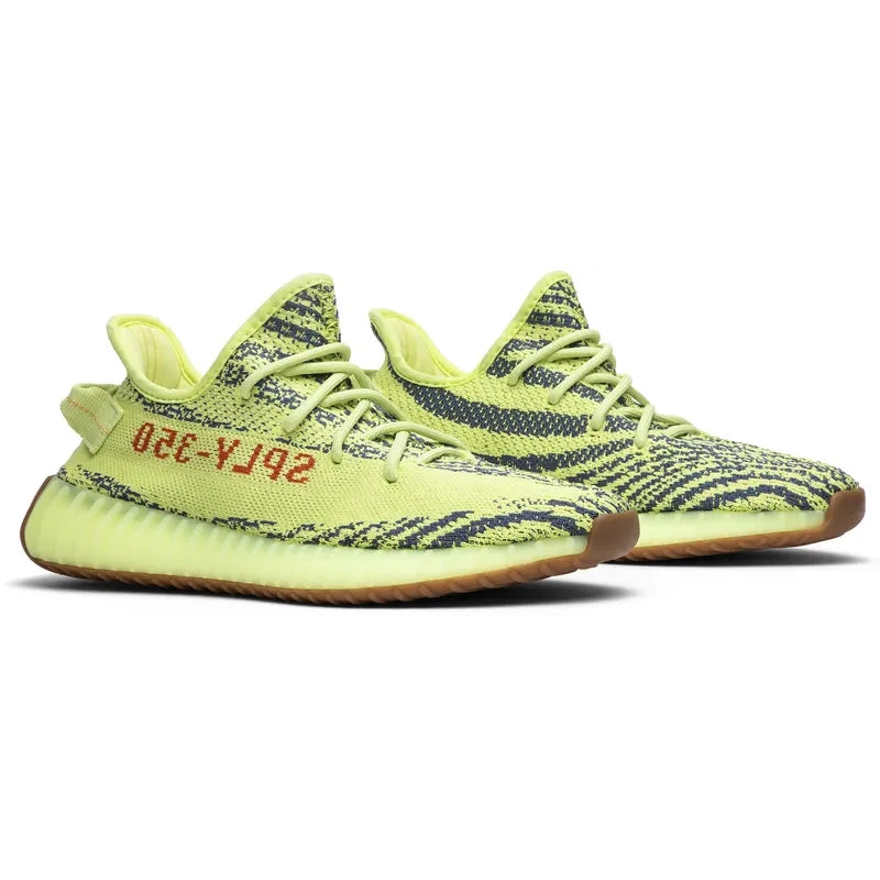 100% authentic Yeezy Boost 350 V2 Frozen Yellow sneakers. Used pair, no box. Shipped from NZ with AU shipping. Iconic Kanye West design with Adidas comfort.