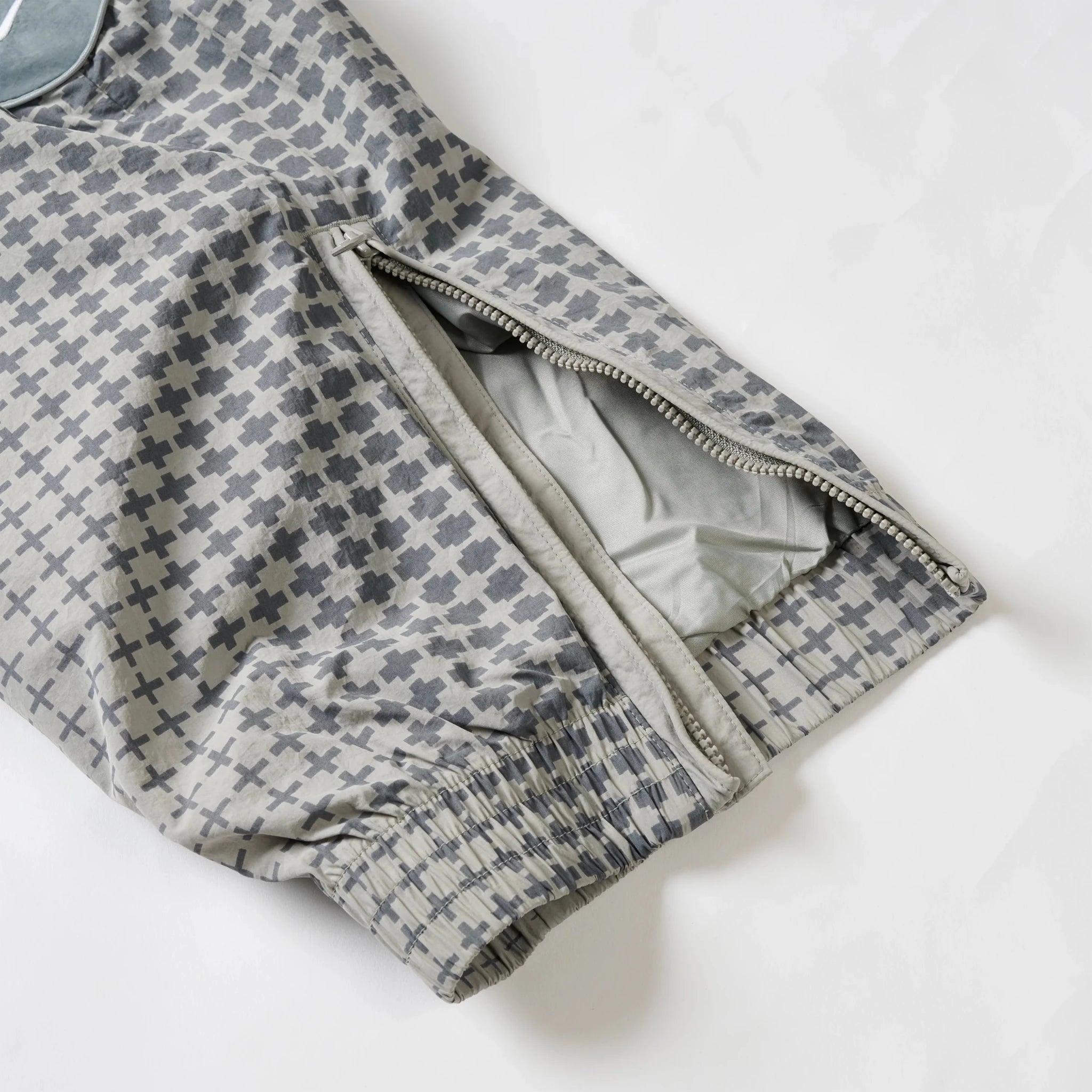 PALACE NIKE ENGLAND SOLO SWOOSH TRACK PANTS PEWTER GREY / COOL GREY / BRIGHT CRIMSON by prosper - prosper